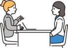 女性が女性の職員に相談している様子。