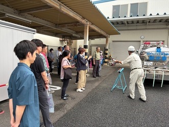 写真：仮設散水栓の説明